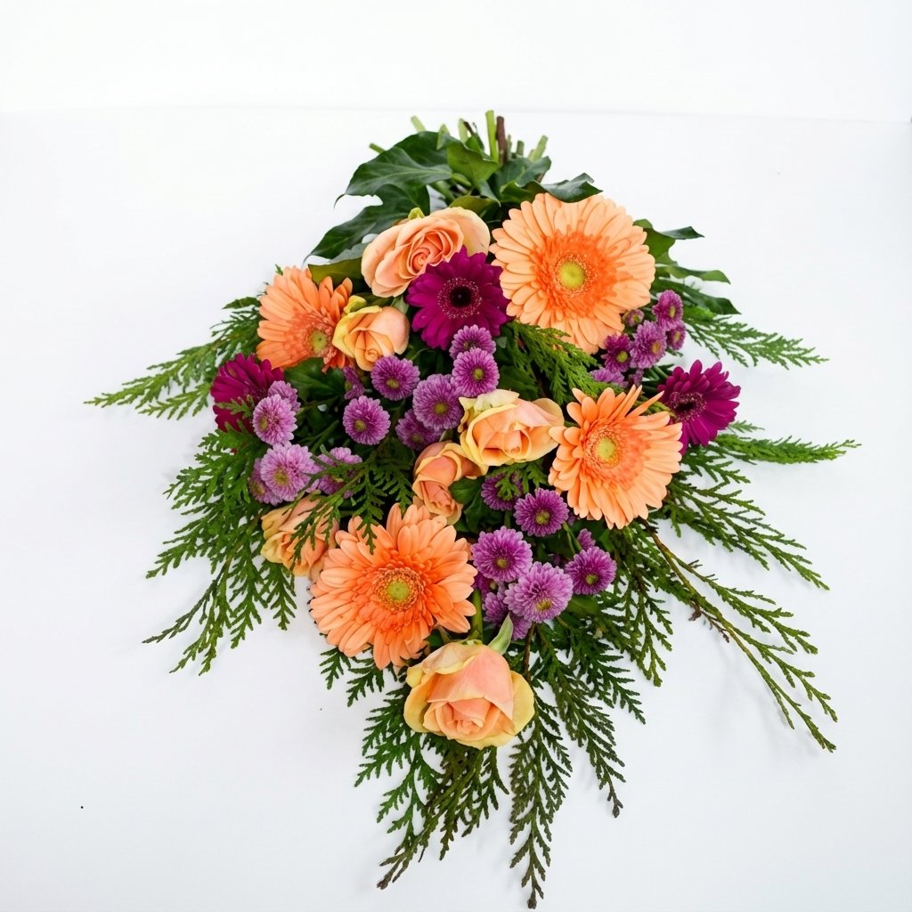 Bårebuket i laksefarvet og lilla